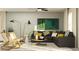Bright living room featuring a modern sectional sofa and stylish decor at 6483 Propel Run, New Port Richey, FL 34655