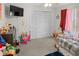 bedroom featuring a large closet, ceiling fan and lots of space to play at 8712 Ashbury Dr, Hudson, FL 34667