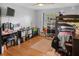 Bedroom featuring a bunk bed, built-in storage and hardwood floors at 8712 Ashbury Dr, Hudson, FL 34667
