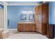 Large bathroom with and sinks, custom cabinetry, and lots of storage at 10117 Breezy Pines Ct, Weeki Wachee, FL 34613