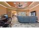 Entertainer's living space with a bar, access to the outdoor pool, and an open floor plan at 10117 Breezy Pines Ct, Weeki Wachee, FL 34613