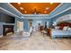 Spacious main bedroom with fireplace, seating area, and a large walk-in closet at 10117 Breezy Pines Ct, Weeki Wachee, FL 34613