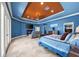 Spacious main bedroom with a seating area, fireplace, and large windows for natural light at 10117 Breezy Pines Ct, Weeki Wachee, FL 34613
