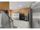 Pet grooming area and kennel with stainless steel grooming tub and kennels at 10117 Breezy Pines Ct, Weeki Wachee, FL 34613