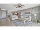 Inviting living room filled with bright, natural light and neutral decor at 10355 Paradise Blvd # 413, Treasure Island, FL 33706