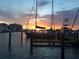 Beautiful sunset over the marina, highlighting the boats and waterfront community at 10355 Paradise Blvd # 413, Treasure Island, FL 33706