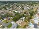 Expansive aerial view of a residential neighborhood with tree-lined streets and well-maintained homes in a Gathering-friendly community at 11029 90Th Ave, Seminole, FL 33772