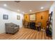 Comfortable sitting area with decorative accents, wood floors, and neutral decor at 11029 90Th Ave, Seminole, FL 33772