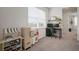 Bedroom with play kitchen and desk at 11227 Moultrie Pl, Tampa, FL 33625