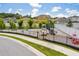 Elevated aerial view of a playground featuring slides and play structures for children at 11227 Moultrie Pl, Tampa, FL 33625