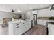 Bright kitchen featuring a large island, stainless steel appliances, and modern white cabinetry at 116 W Stanley St, Tampa, FL 33604