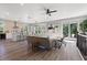 Open concept living space with lots of light and access to a balcony at 116 W Stanley St, Tampa, FL 33604