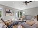 Bright living room featuring modern furniture and access to an outdoor balcony at 116 W Stanley St, Tampa, FL 33604