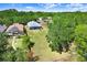 Spacious lot with mature trees, a screened-in lanai, and privacy fence create a peaceful outdoor space at 1177 Emerald Hill Way, Valrico, FL 33594