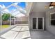 Spacious screened lanai offers a seamless transition to outdoor living at 1177 Emerald Hill Way, Valrico, FL 33594