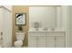 Bright bathroom with double vanity, granite counters, and shower with tub combination at 12054 Violet Jasper Dr, Parrish, FL 34219