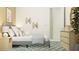 Comfortable bedroom with soft lighting, stylish decor, and a cozy grey bed at 12054 Violet Jasper Dr, Parrish, FL 34219