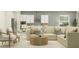Open-concept living area with a cozy sectional sofa and modern decor at 12054 Violet Jasper Dr, Parrish, FL 34219