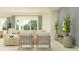 Comfortable living room with a large window, neutral palette, and decorative accents at 12054 Violet Jasper Dr, Parrish, FL 34219