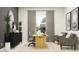 Comfortable home office featuring neutral tones, ample light, and stylish furnishings at 12058 Violet Jasper Dr, Parrish, FL 34219