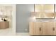 Bright hallway area featuring modern furniture, neutral colors, and recessed lighting at 12062 Violet Jasper Dr, Parrish, FL 34219