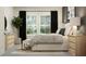 Bright bedroom featuring large windows, dark curtains, and matching end tables with lamps at 12062 Violet Jasper Dr, Parrish, FL 34219