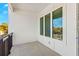 A relaxing balcony with tiled floors, exterior views, and white walls at 121 E Warren Ave # 1, Tampa, FL 33602