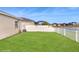 Lush, well-maintained backyard with privacy fence, ideal for Gathering gatherings and outdoor enjoyment at 13414 Graham Yarden Dr, Riverview, FL 33579