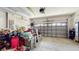 Spacious garage with ample storage space for vehicles, sporting equipment, and household items at 13414 Graham Yarden Dr, Riverview, FL 33579