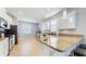 Well-lit kitchen boasting granite countertops and stainless steel appliances, perfect for culinary enthusiasts at 13414 Graham Yarden Dr, Riverview, FL 33579