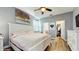 Spacious main bedroom with wood floors, ensuite bathroom and walk-in closet access at 13414 Graham Yarden Dr, Riverview, FL 33579