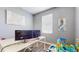 Bright office space with two monitors and fun decor, perfect for working from home at 13414 Graham Yarden Dr, Riverview, FL 33579