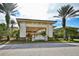 View of the entrance to Club Renaissance at 1348 Emerald Dunes Dr, Sun City Center, FL 33573