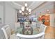 Bright dining area offering an open layout with views of the kitchen and living room, perfect for entertaining at 1348 Emerald Dunes Dr, Sun City Center, FL 33573