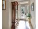 Welcoming foyer with a decorative glass door and tiled flooring at 1348 Emerald Dunes Dr, Sun City Center, FL 33573