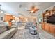 Open-concept living room with a view of the kitchen and dining area, perfect for entertaining and Gathering time at 1348 Emerald Dunes Dr, Sun City Center, FL 33573