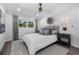 Cozy bedroom featuring neutral color palette, contemporary decor, and plenty of natural light at 1404 84Th N Ave, St Petersburg, FL 33702