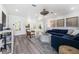 Inviting living space with modern decor, a comfortable blue sofa, and stylish furnishings at 1404 84Th N Ave, St Petersburg, FL 33702