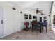 The covered patio offers ceiling fans, a grill, and an outdoor dining area for enjoying outdoor meals at 1404 84Th N Ave, St Petersburg, FL 33702