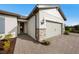 Charming single-Gathering home featuring a two-car garage, stone accents, and beautifully landscaped front yard at 16419 Sapphire Point Dr, Lakewood Ranch, FL 34211