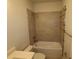 Bathroom with tub and shower and tiling installed at 1643 Springwell Ln, Sarasota, FL 34240