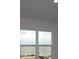 Bedroom with view featuring bright windows and a scenic view at 1643 Springwell Ln, Sarasota, FL 34240