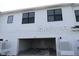 Spacious garage with ample room for parking and storage in this bright, modern home at 1643 Springwell Ln, Sarasota, FL 34240