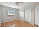 Bedroom has modern floors, and large closet space at 1812 Teakwood Ln, Dunedin, FL 34698