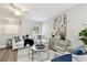 Bright living room featuring stylish furnishings, a ceiling fan, and contemporary decor at 1812 Teakwood Ln, Dunedin, FL 34698