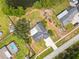 Birds eye view of home's roof, large backyard, and swimming pool at 18408 Hanna Rd, Lutz, FL 33549