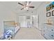 Cozy bedroom with a ceiling fan at 18408 Hanna Rd, Lutz, FL 33549