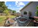 Backyard raised garden beds, garden bench and trellises at 18408 Hanna Rd, Lutz, FL 33549