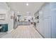 Updated kitchen with stainless steel appliances, gray cabinets, and an open design at 18408 Hanna Rd, Lutz, FL 33549