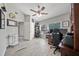 This home office features a ceiling fan and nice natural light at 18408 Hanna Rd, Lutz, FL 33549
